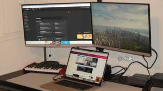 A MacBook Air powering external monitors with the StarTech adapter.