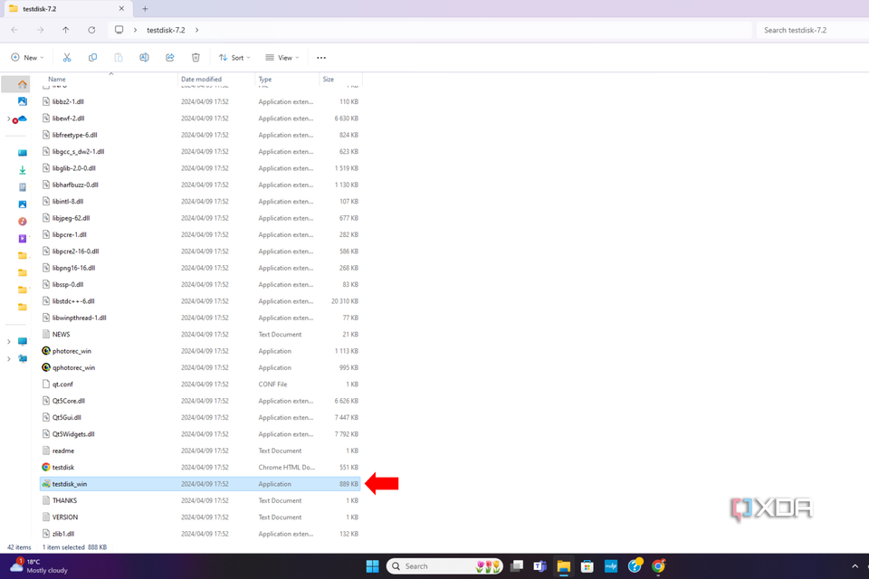 The file explorer tab with the TestDisk application highlighted and an arrow pointing to it