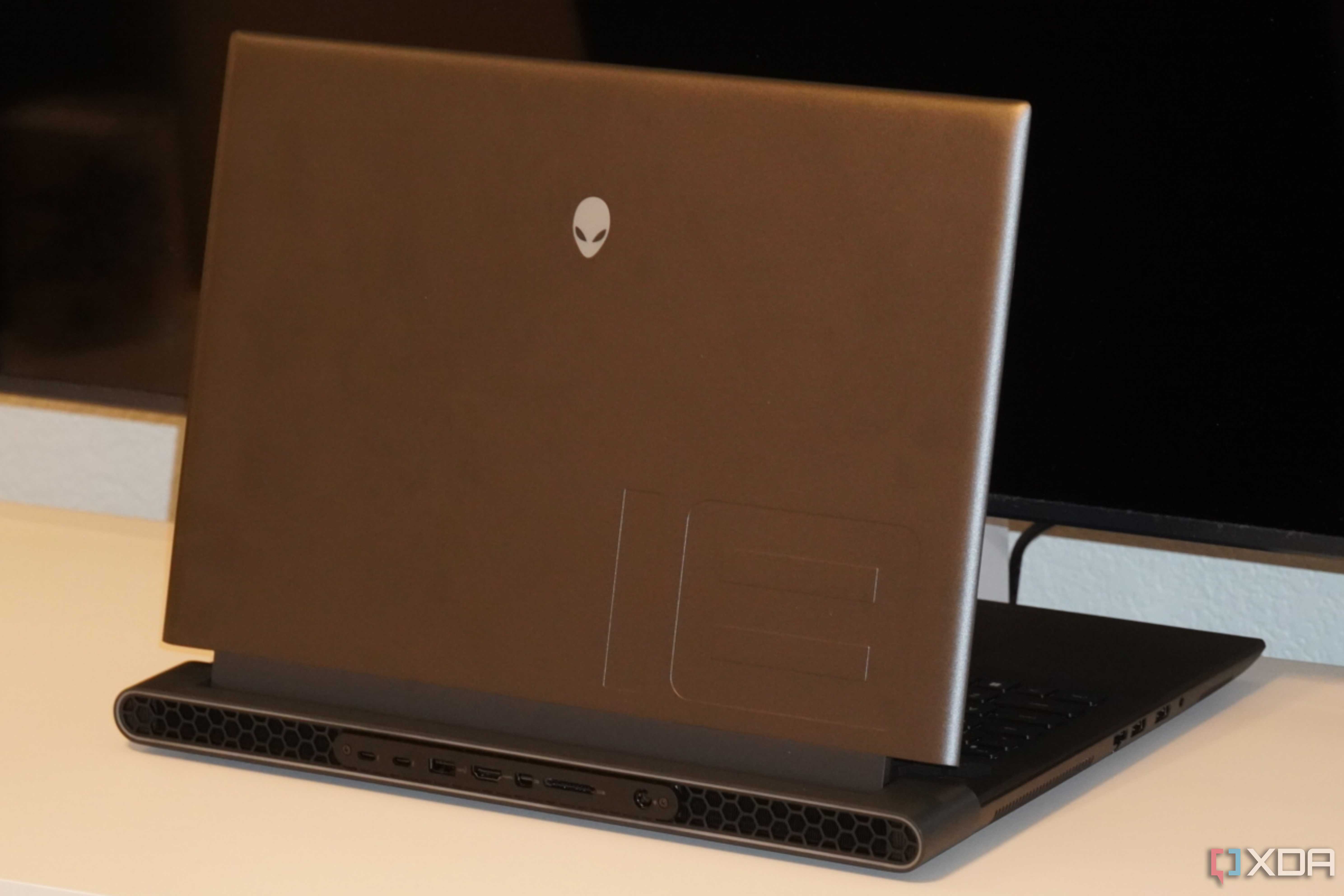 A half-opened Alienware m18 R2 gaming laptop.
