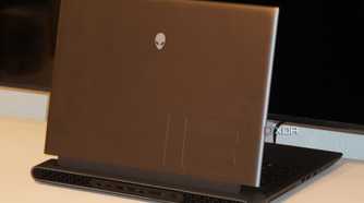 A half-opened Alienware m18 R2 gaming laptop.