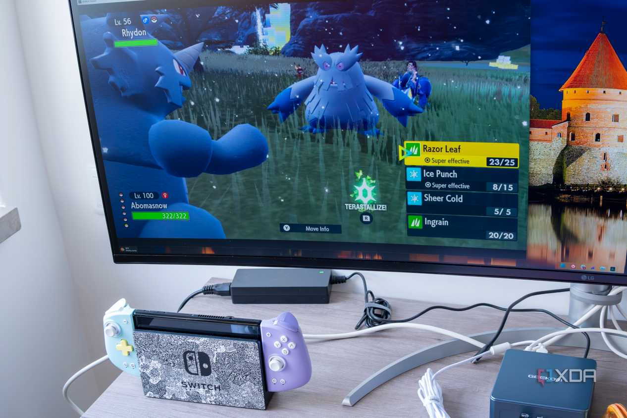 A NIntendo Switch next to a computer monitor displaying a video feed from the Switch