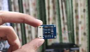 A person holding a BME280 sensor