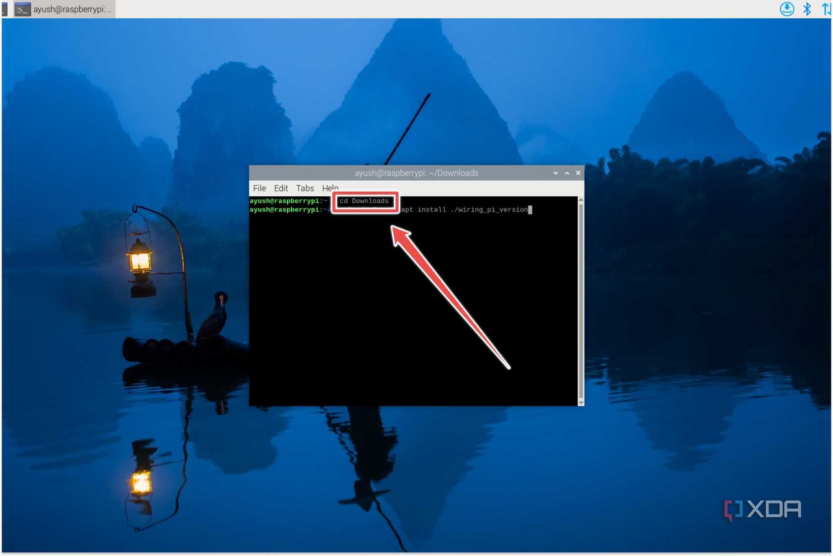 The cd command to switch to the Downloads folder
