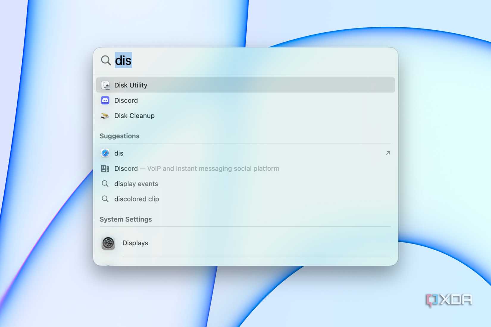Searching for Disk Utility in Spotlight.