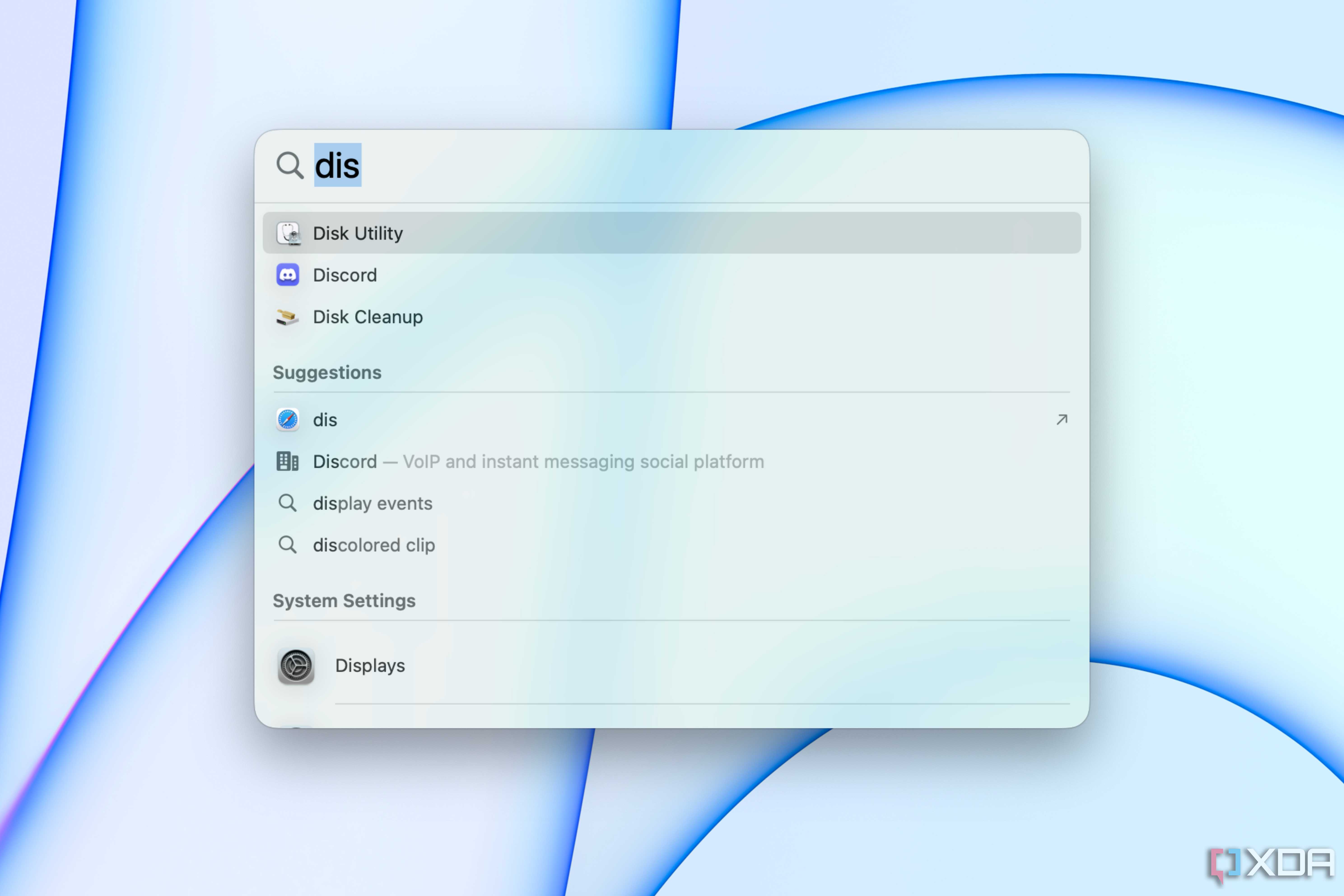 Searching for Disk Utility in Spotlight.