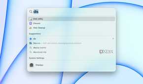 Searching for Disk Utility in Spotlight.