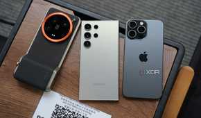 xiaomi 14 ultra, s24 ultra and iphone 15 pro max side by side on a table