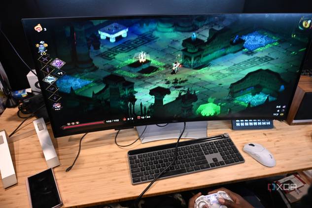 Video game Hades played on Dell UltraSharp 40 Curved Thunderbolt Hub Monitor