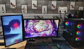 Two monitors placed side by side, with the one on the left running in portrait mode