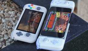 An iPhone next to an Android gaming handheld.