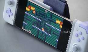 An iPhone running Mario on Delta Emulator.