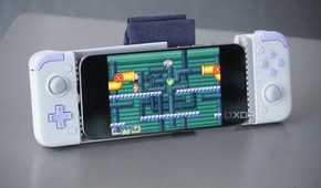 An iPhone connected to a bulky external game controller.