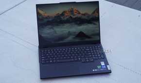 The Lenovo Legion Pro 7i on a concrete bench.