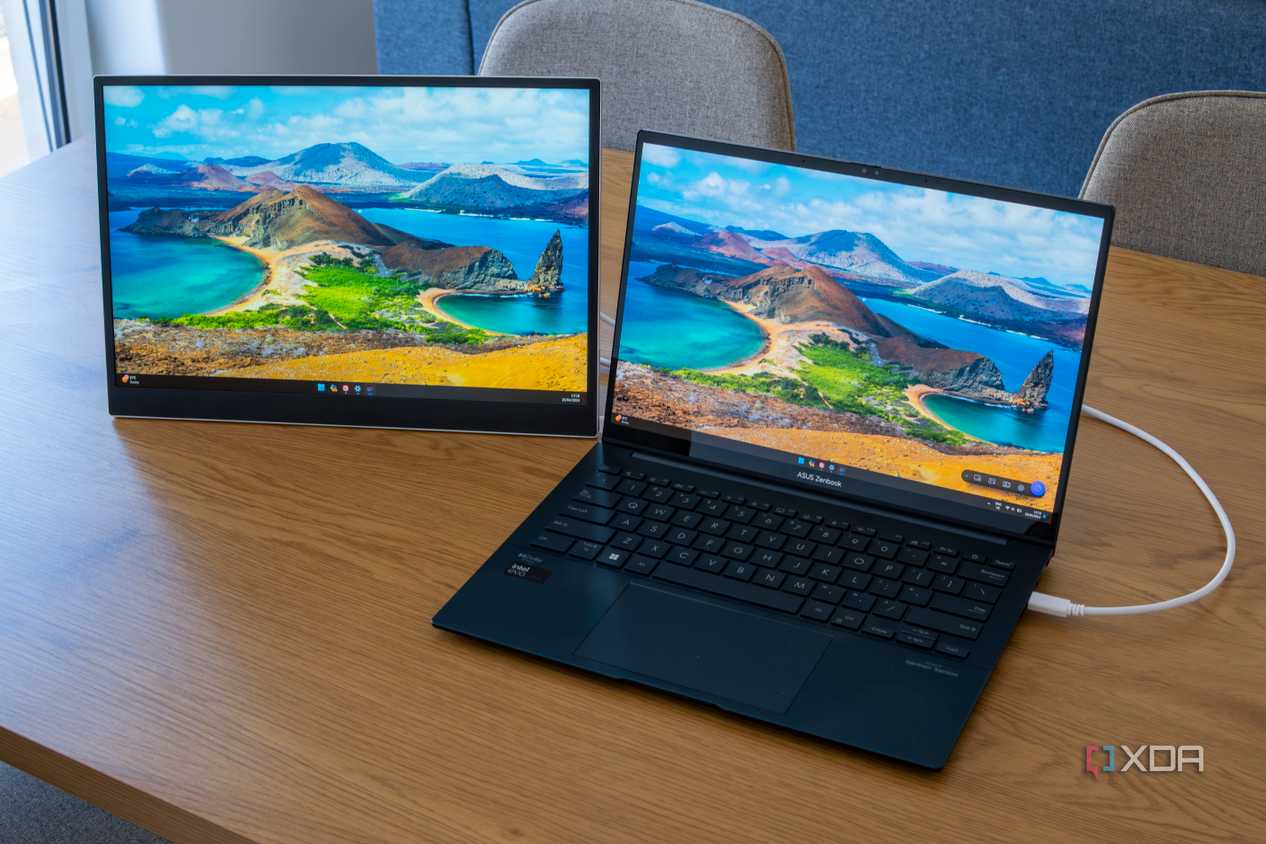 An LG Gram +View next to a laptop with both screens showing the Windows 11 desktop