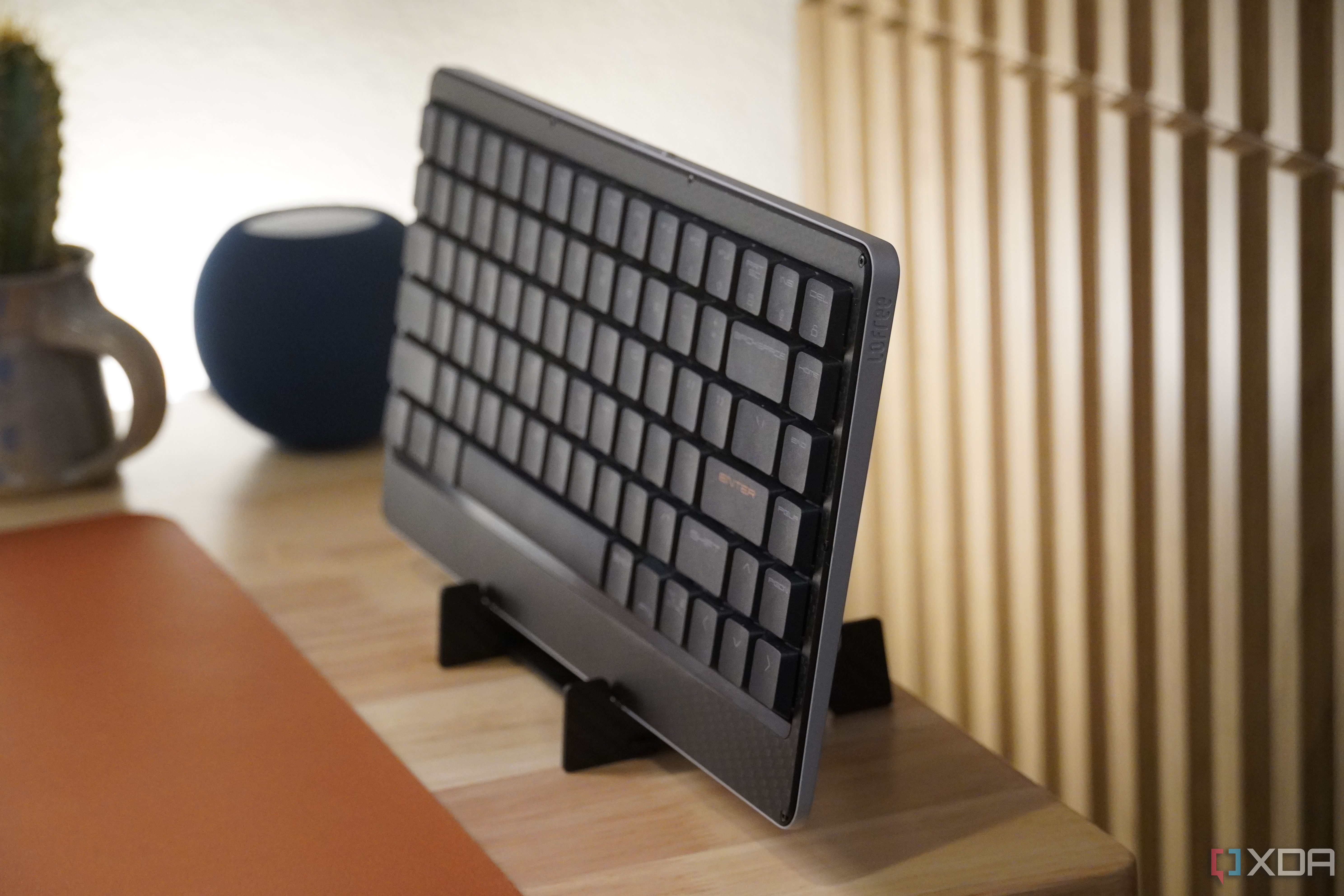 A side view of the Lofree Edge on a stand.