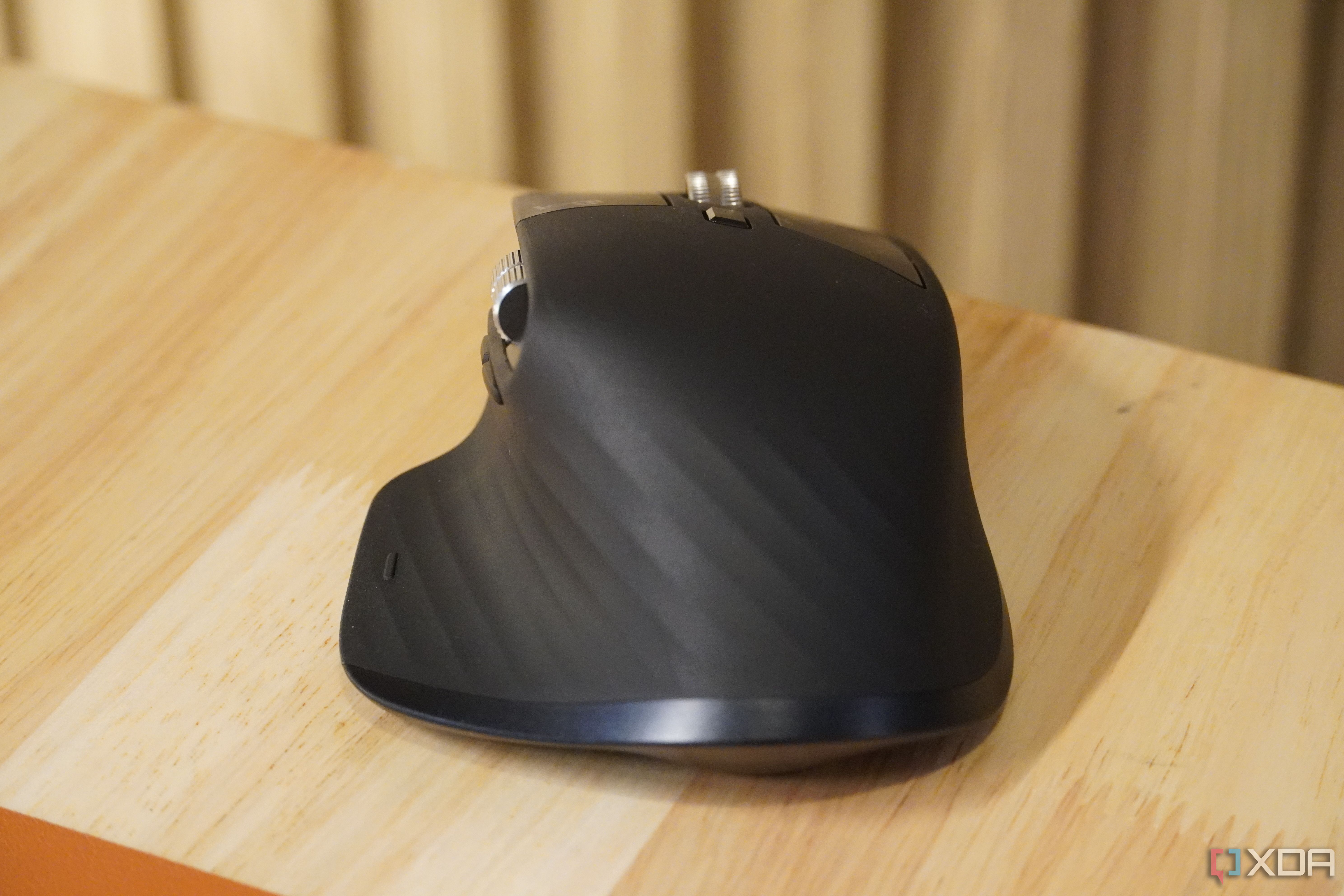 The back of the MX Master 3S on a desk.