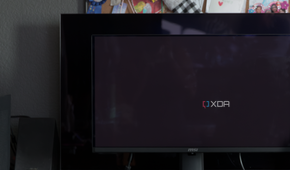 The MSI MAG 271QPX next to the LG C2 showing the difference in black levels