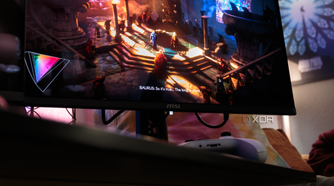 A cutscene being shown on the MSI MAG 271QPX with a controller present