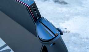 Close-up of the two USB Type-C ports on the One XPlayer with the controllers attached