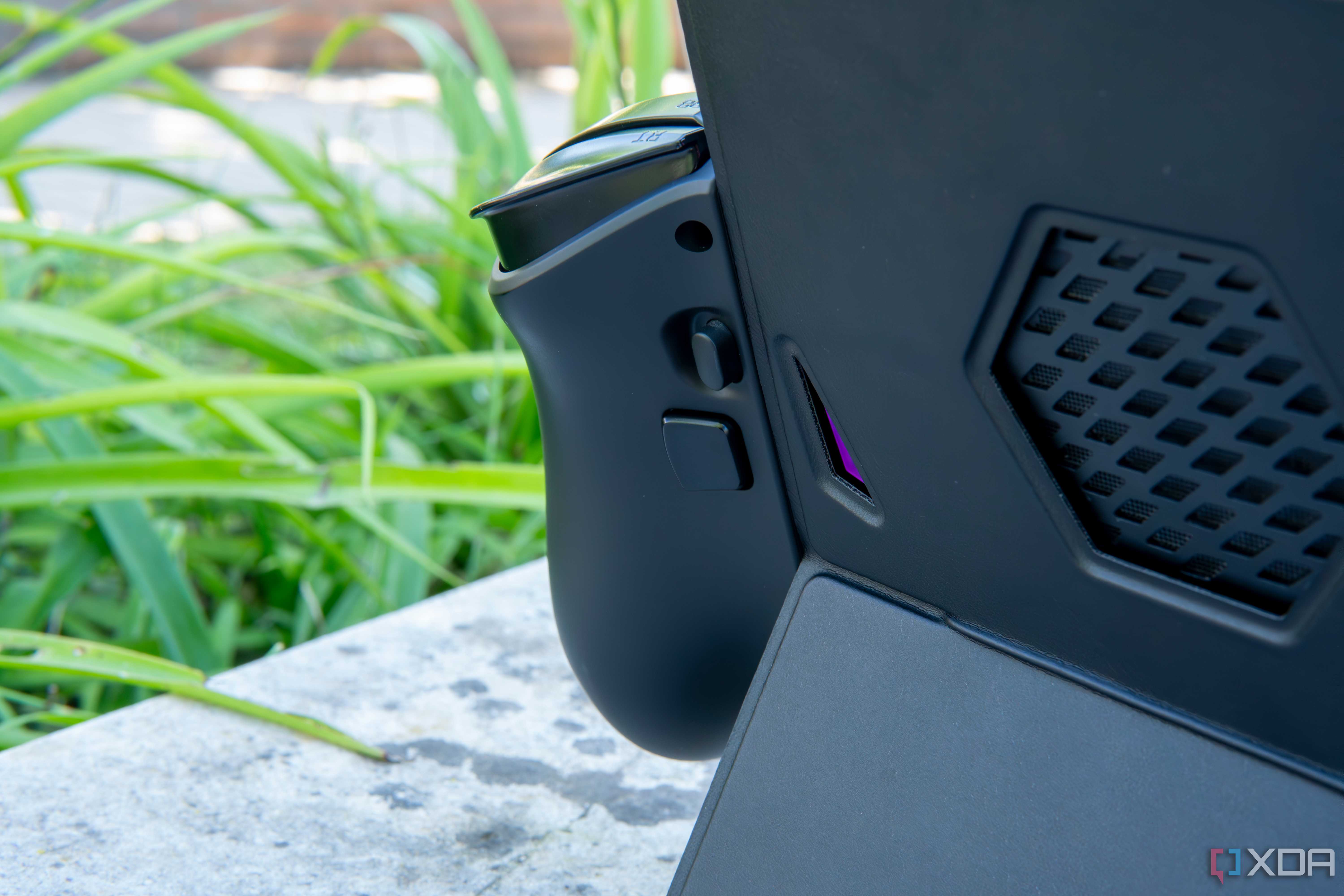 Close-up of the rear of a One XPlayer X1 controller connected to the tablet