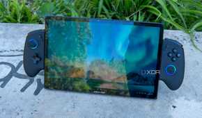 Angled front view of the One XPlayer X1 showing the Windows 11 desktop