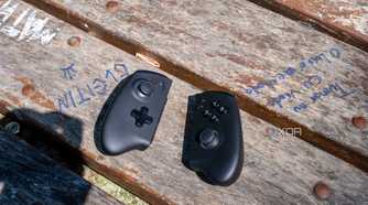 One XPlayer X1 controllers detached and set down on a wooden table