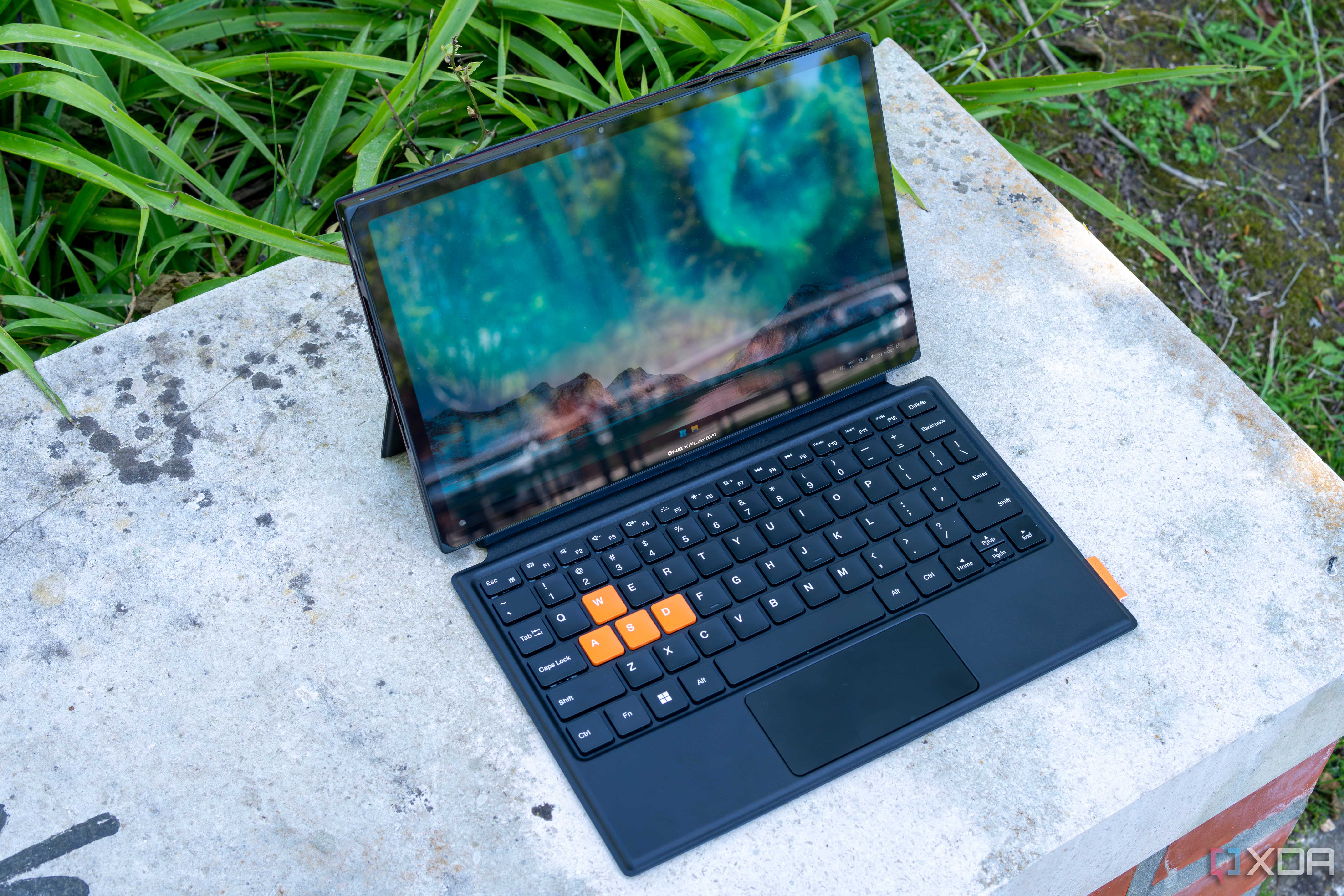 Angled view of the One XPlayer facing right with the keyboard attached