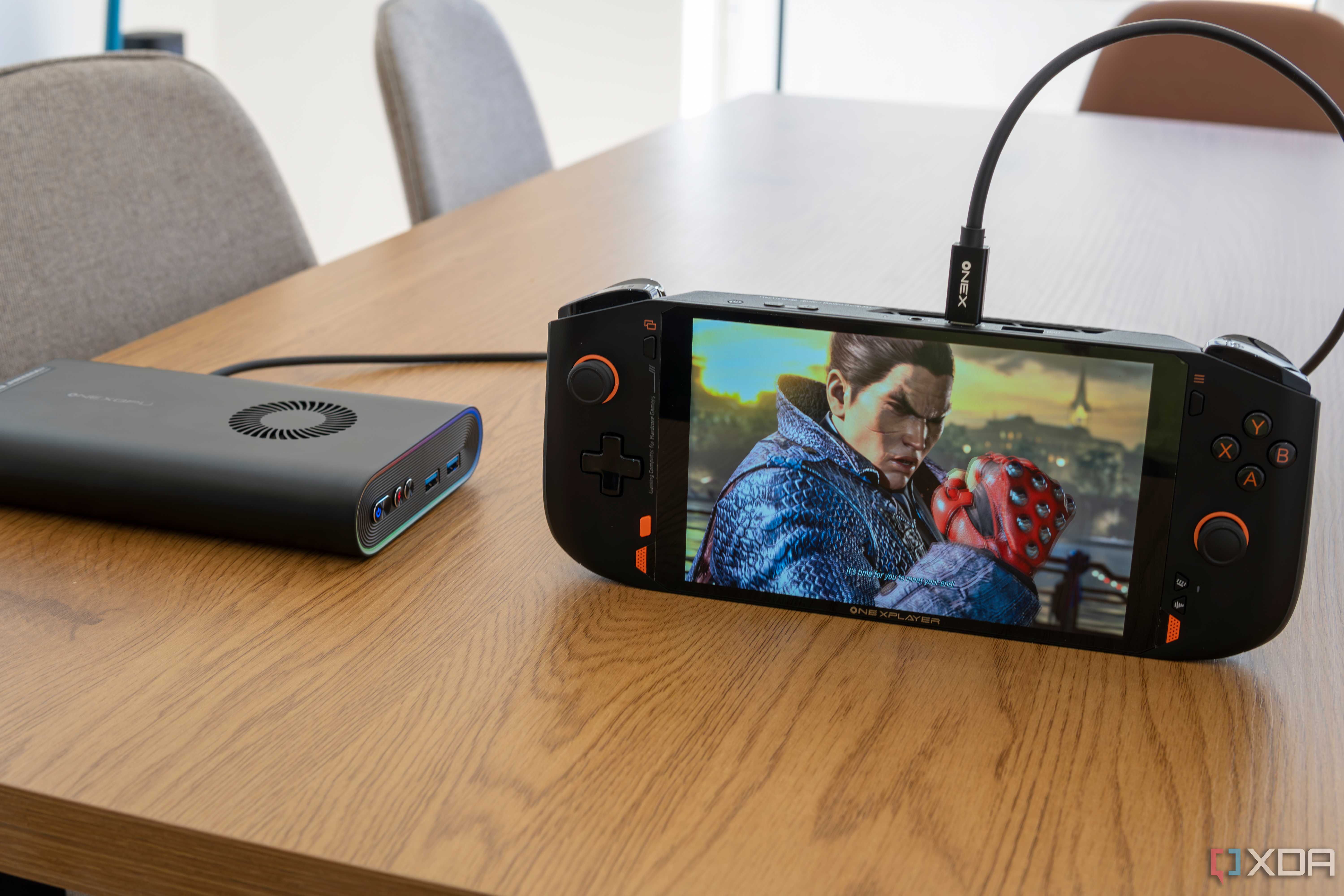 A One Xplayer Mini Pro connected to a OneXGPU while playing Tekken 8