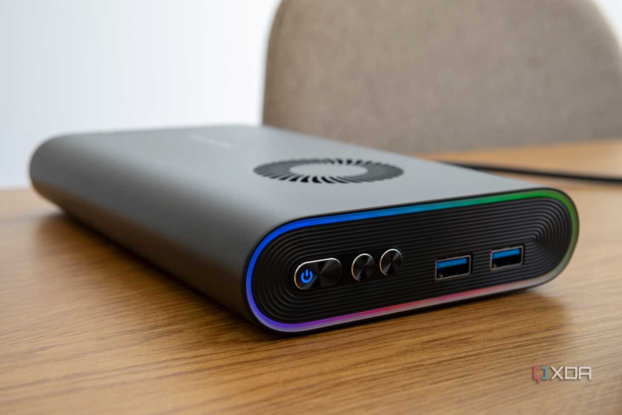 Close-up of the OneXGPU showing the power and turbo buttons plus two USB ports