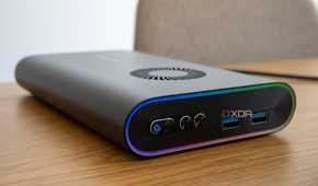Close-up of the OneXGPU showing the power and turbo buttons plus two USB ports