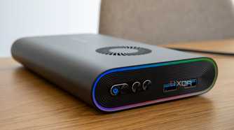 Close-up of the OneXGPU showing the power and turbo buttons plus two USB ports