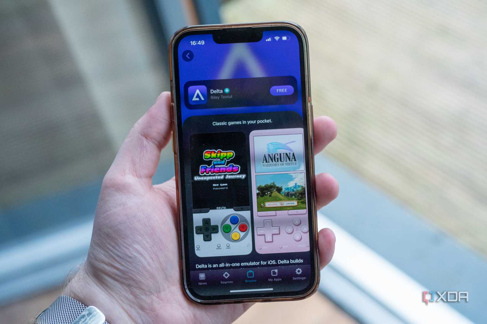 Delta being downloaded through AltStore on the iPhone 13 Pro