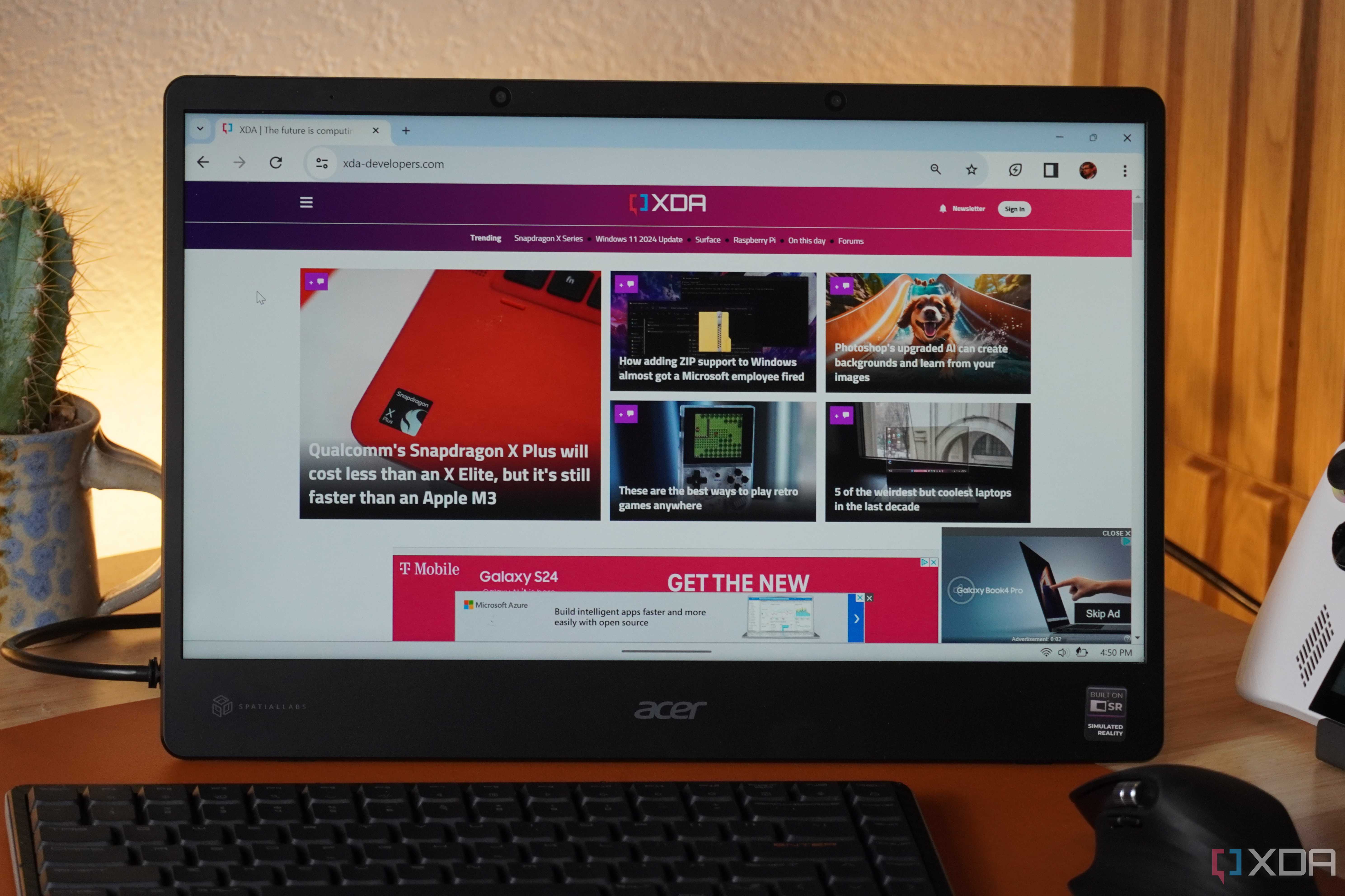 A close-up of a portable monitor being powered by an ROG ALLY.