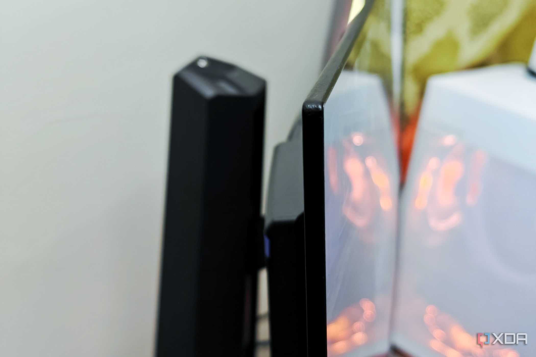 An image showing the side profile of the Asus PG27AQDM monitor.