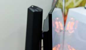 An image showing the side profile of the Asus PG27AQDM monitor.