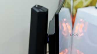 An image showing the side profile of the Asus PG27AQDM monitor.