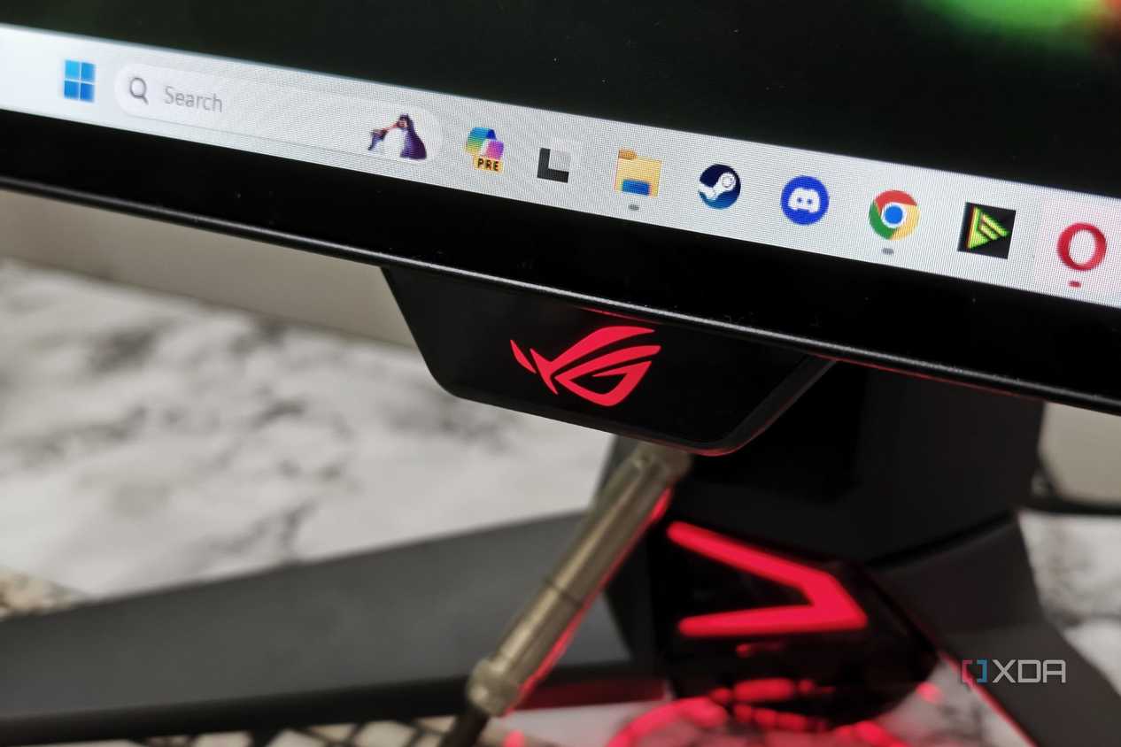 An image showing the Asus logo on the ROG PG27AQDM monitor.