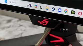 An image showing the Asus logo on the ROG PG27AQDM monitor.