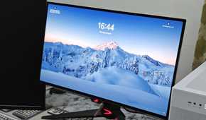 An image showing the Asus ROG PG27AQDM monitor displaying the Windows loackscreen.