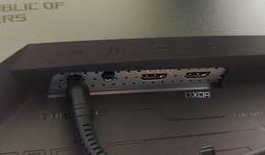 An image showing the left side ports of the Asus PG27AQDM monitor.