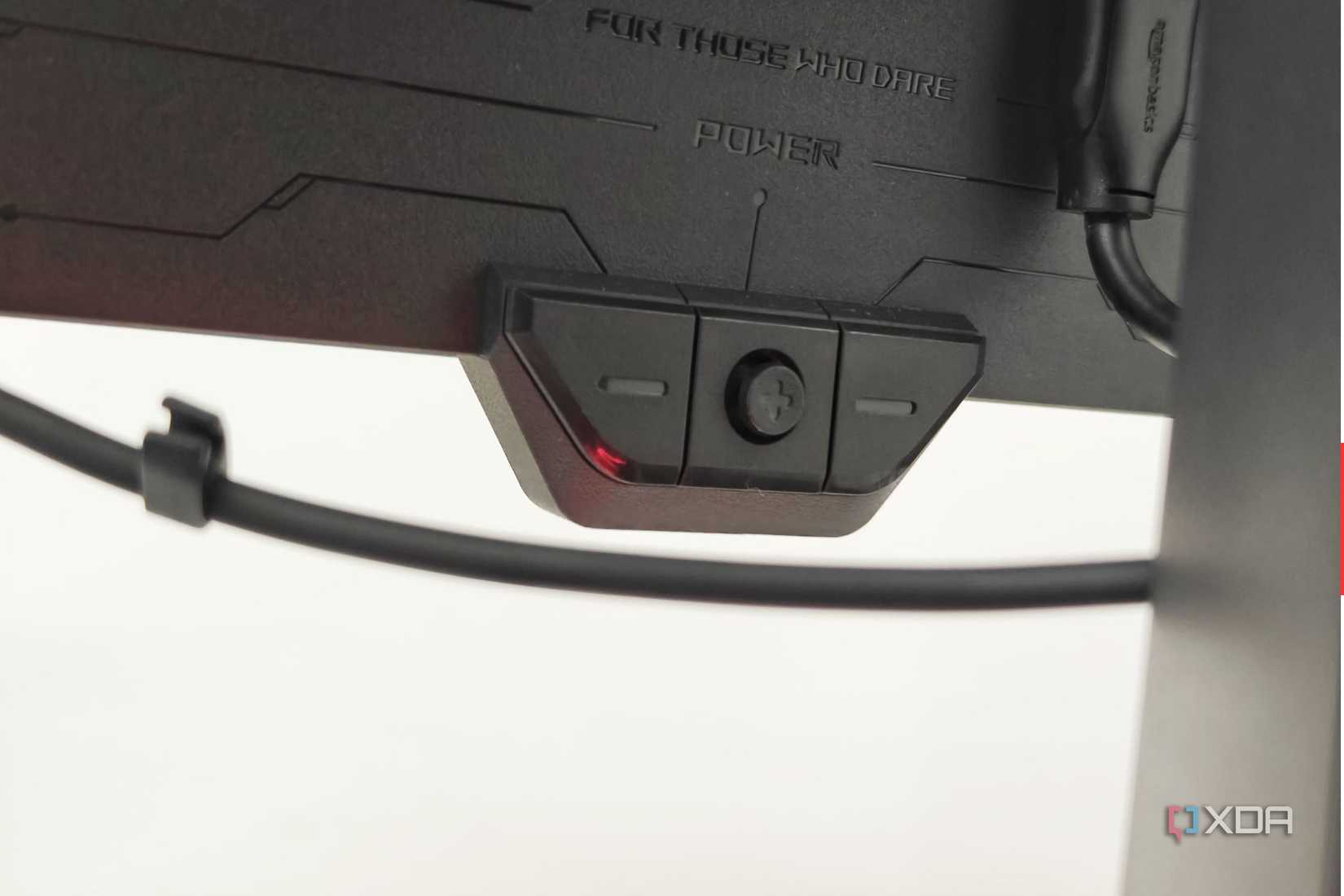 An image showing the OSD controller on the Asus ROG Swift PG27AQDM monitor.