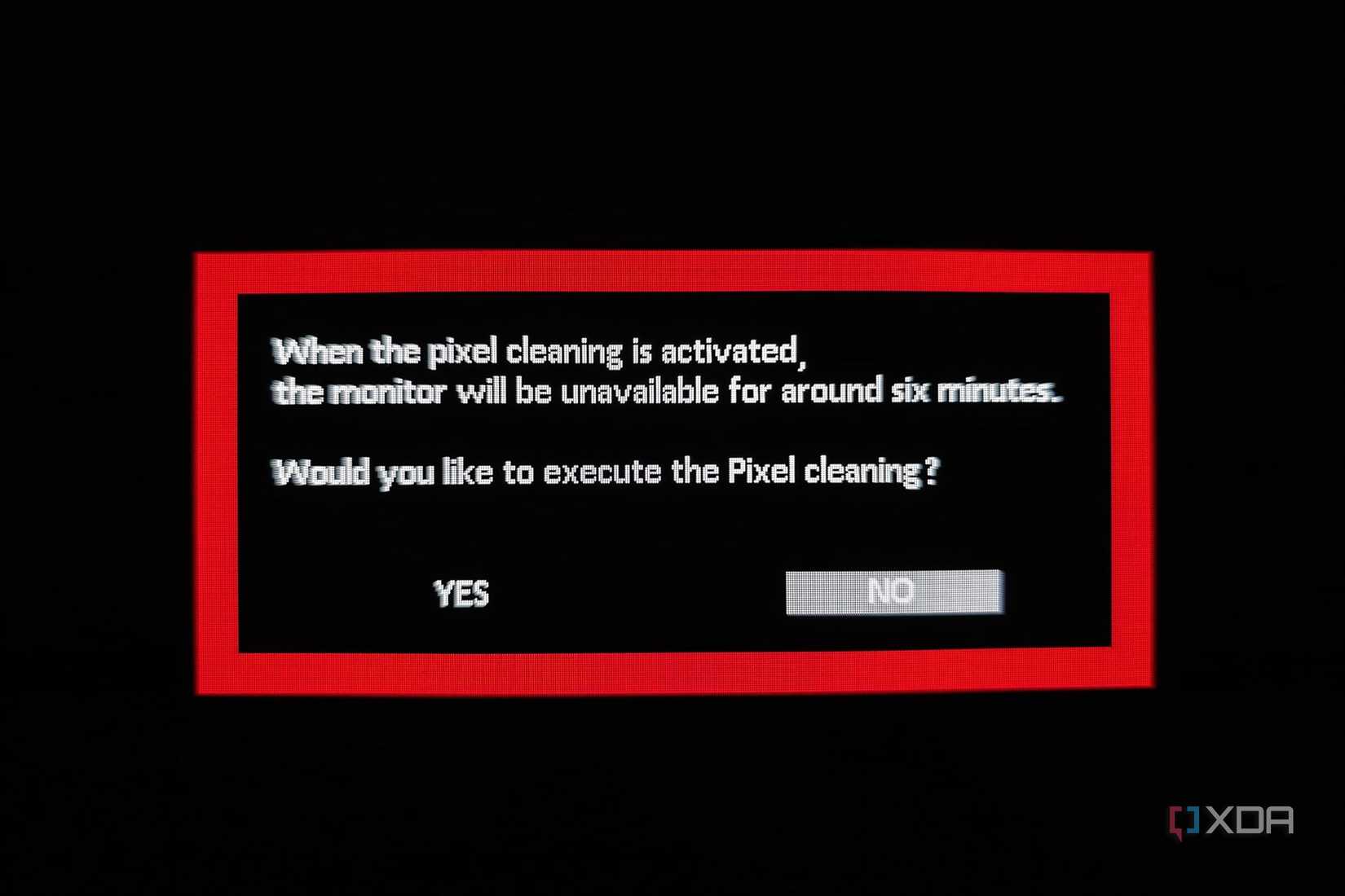 An image showing the Pixel cleaning routine pop-up on an ASUS ROG Swift PG27AQDM gaming monitor.