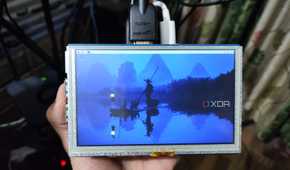A Raspberry Pi 5 with a portable display attached to it
