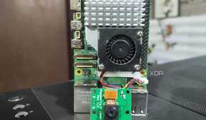 A Raspberry Pi 5 kept next to a camera module
