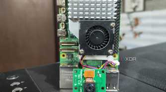 A Raspberry Pi 5 kept next to a camera module