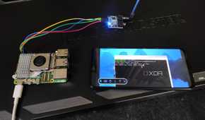 A Raspberry Pi 5 connected to a TEA5767 radio module and a Poco M6 Pro running the FM radio inside the terminal