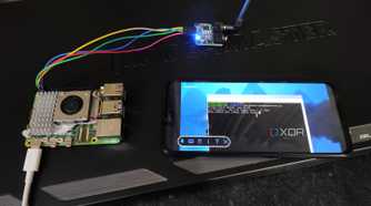A Raspberry Pi 5 connected to a TEA5767 radio module and a Poco M6 Pro running the FM radio inside the terminal