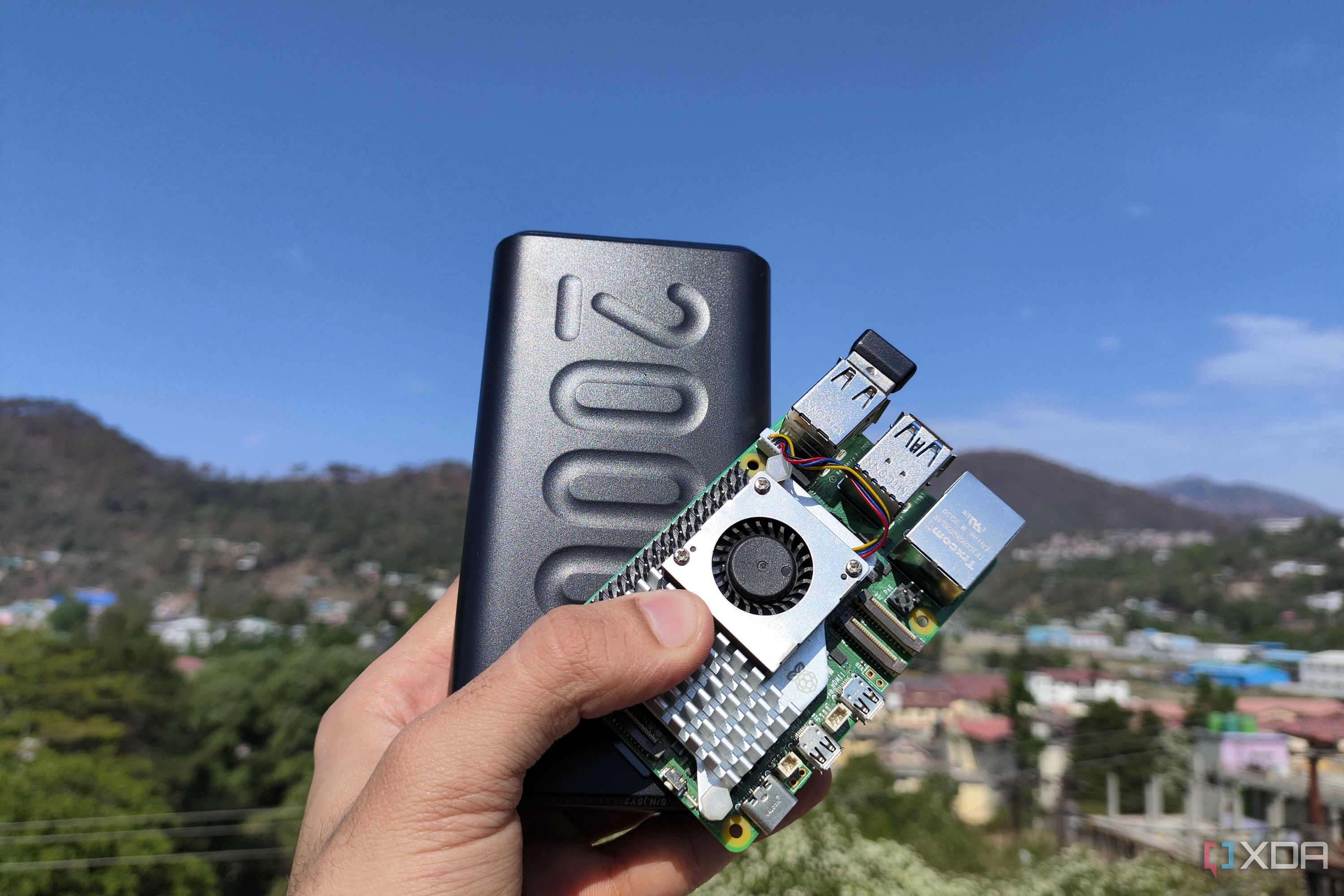 A Raspberry Pi 5 held together with a power bank
