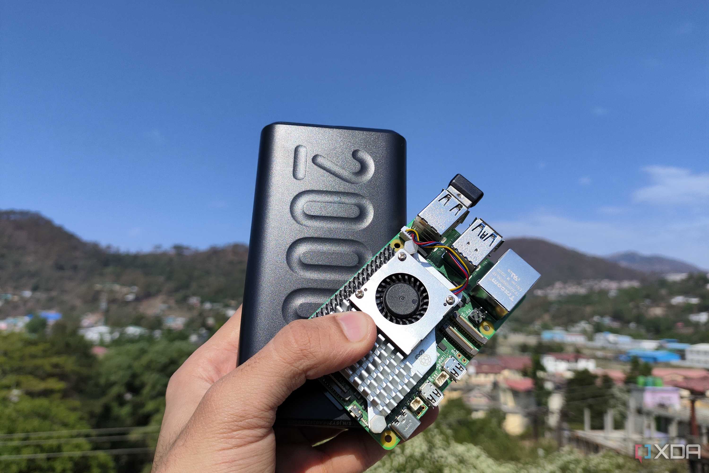 A Raspberry Pi 5 held together with a power bank