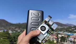 A Raspberry Pi 5 held together with a power bank